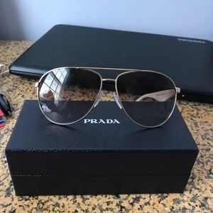 New authentic Prada aviators retail $275